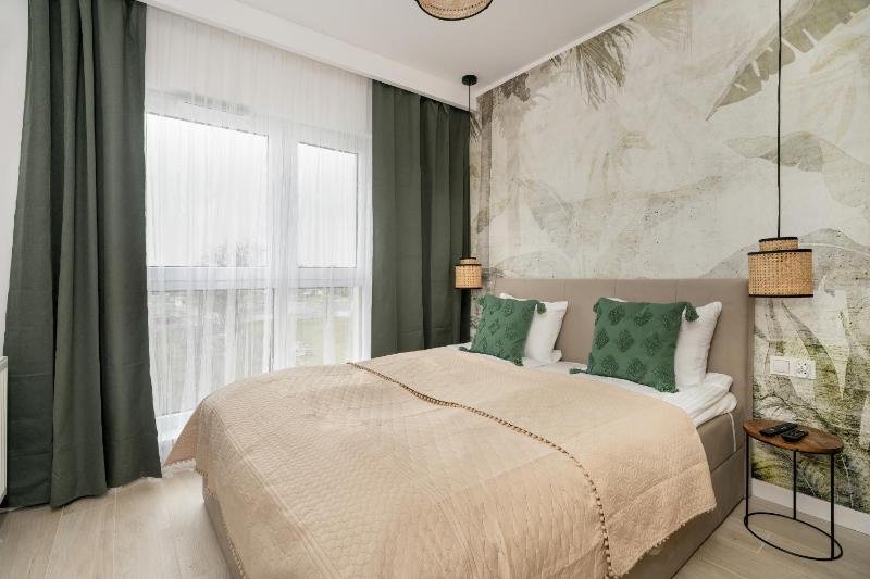 Tasteful Beige Apartment with Parking by Noclegi Renters - image 1