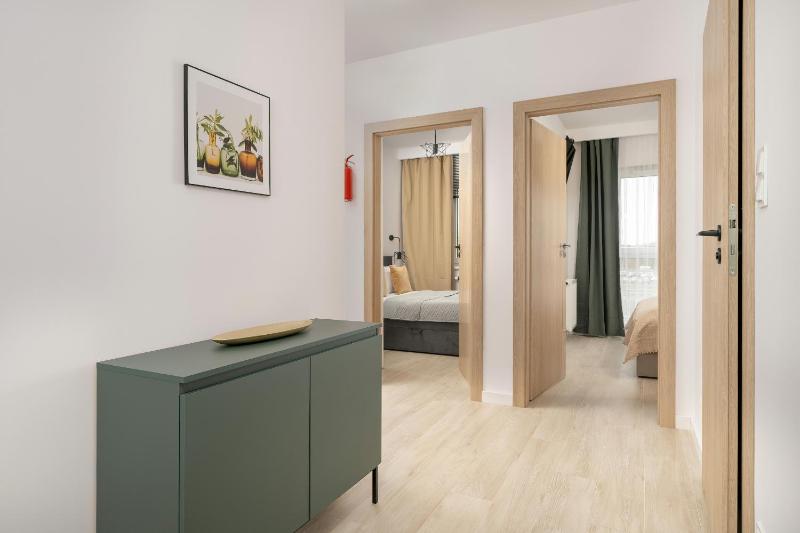 Tasteful Beige Apartment with Parking by Noclegi Renters - image 13