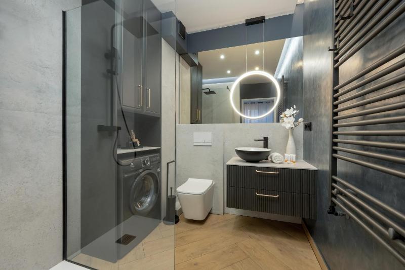 Black and Beige Apartment with Balcony and Parking in Wrocław by Noclegi Renters - image 15