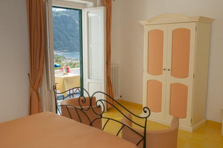 Double or Twin Room with Side Sea View image 3