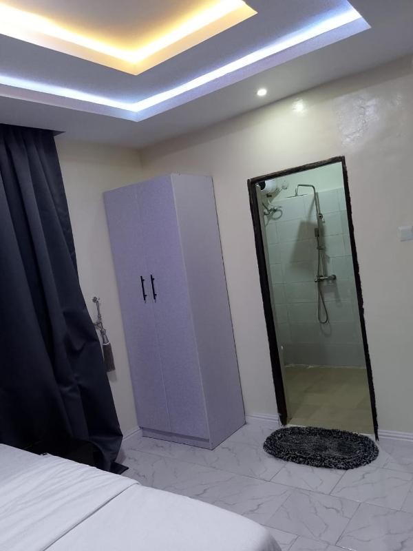 JKA 2-BEDROOM-Apt 24HRS POWER Unlimited WIFI  GARDEN PATIO AREAFREE DAILY HOUSEKEEPING - image 15
