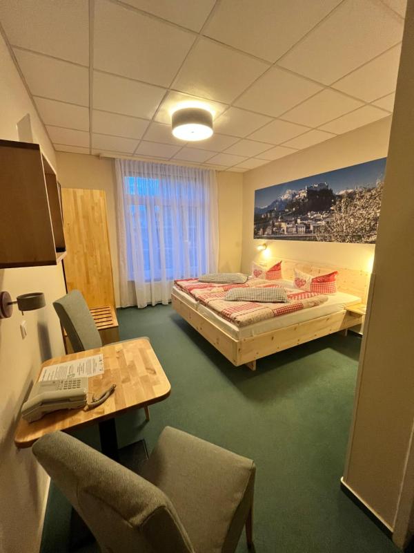 Comfort Double Room - courtyard side image 1