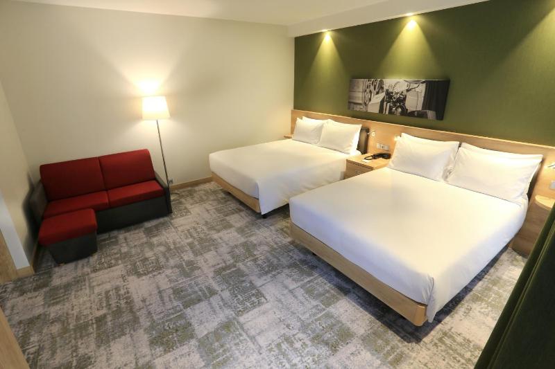 Family Room with Two Queen Beds and City View image 4