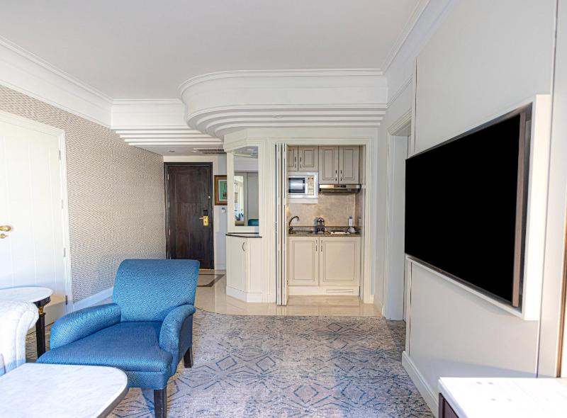 One-Bedroom Suite with Kitchen, Ergonomic Flex Space and Pool View