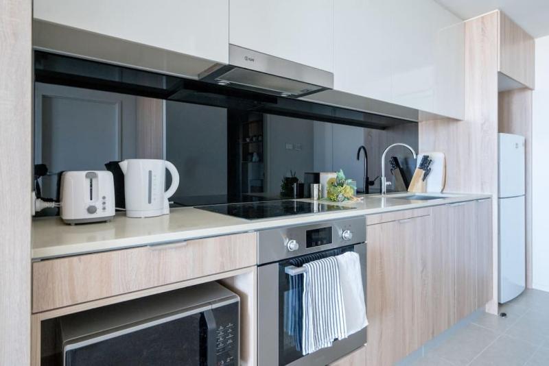 Stunning 1BD Haven with Panoramic City Views - image 16