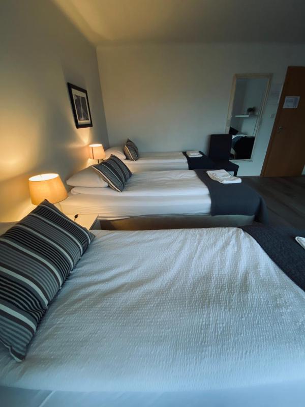 Economy Quadruple Room with Shared Bathroom image 3