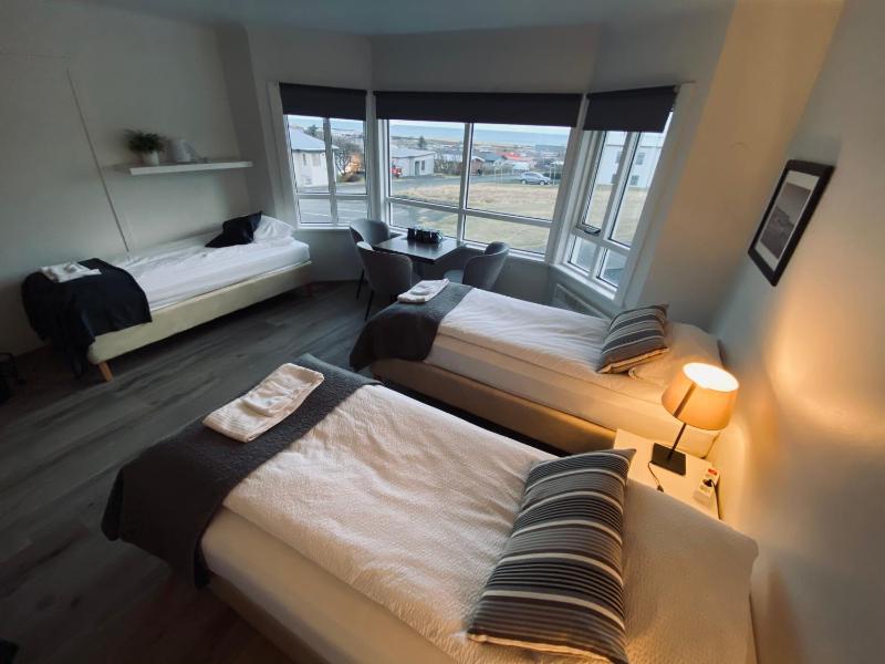 Economy Quadruple Room with Shared Bathroom image 1