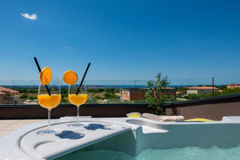 Villa Arestea near Pula with 35 m2 heated pool sea view wellness & kids playground - image 46