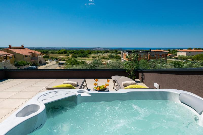 Villa Arestea near Pula with 35 m2 heated pool sea view wellness & kids playground - image 29