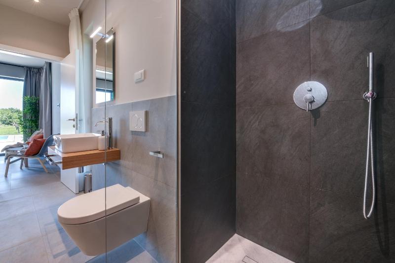Villa Arestea near Pula with 35 m2 heated pool sea view wellness & kids playground - image 26
