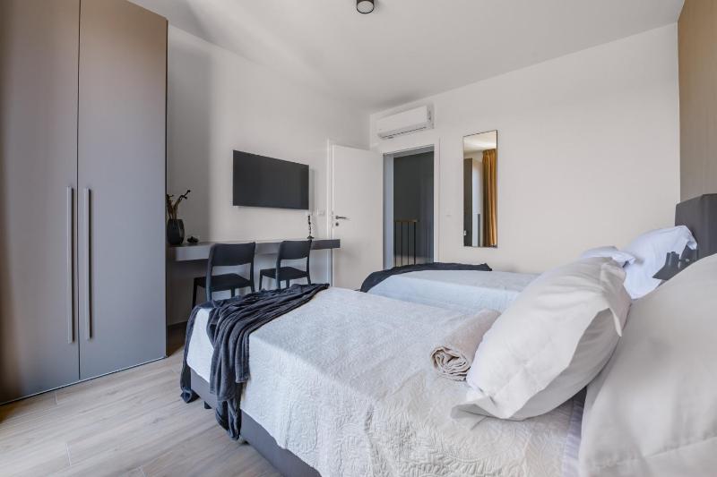 Villa Arestea near Pula with 35 m2 heated pool sea view wellness & kids playground - image 19
