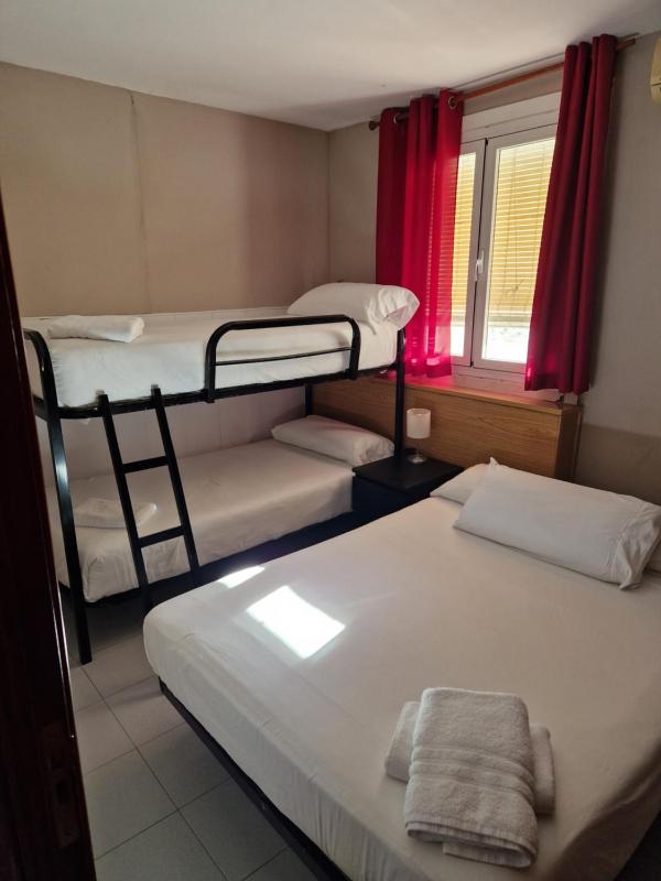 Quadruple Room with Private Bathroom image 1