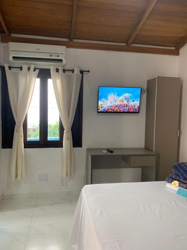 Chalé com lareira & jacuzzi privativa aquecida 300 m da Praia e Roda Gigante - image 18