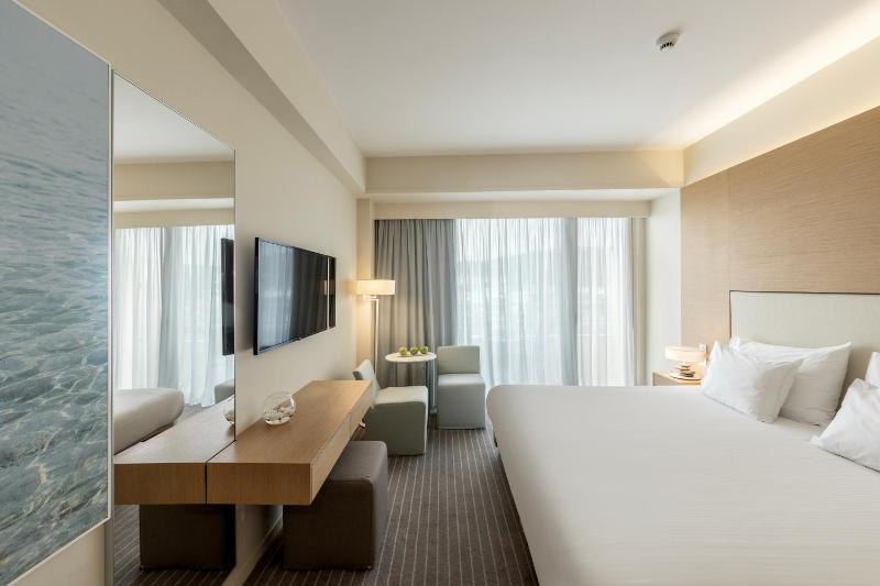 Double or Twin Room with Side Sea View image 1