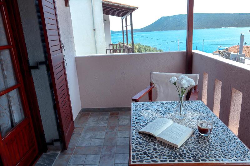 Standard Triple Room with Partial Sea View image 1