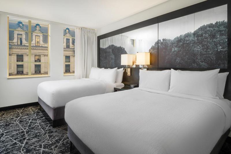 Large Studio Suite with Two Queen Beds and Sofa Bed image 1