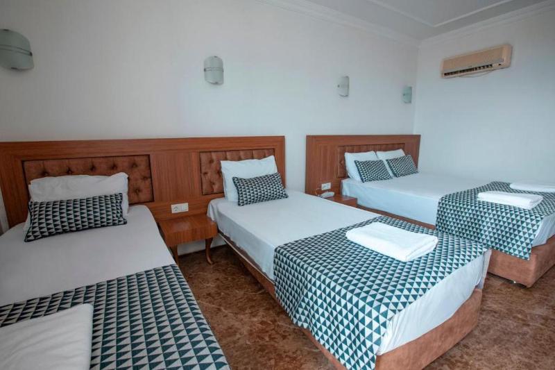 Quadruple Room with Side Sea View image 1