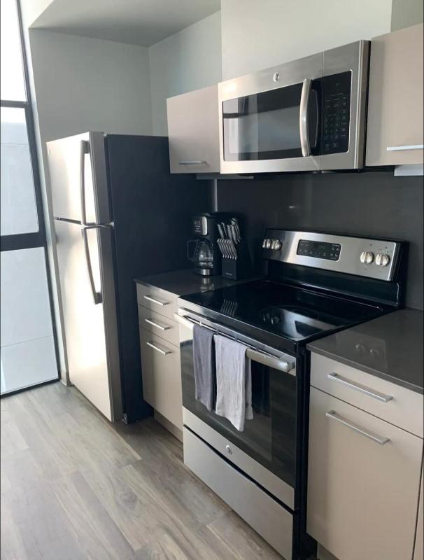Modern 2-Bedroom Apartment in Little Italy - image 4
