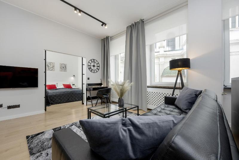 Exclusive Grey and Red Apartment in Warsaw Center by Noclegi Renters - image 12
