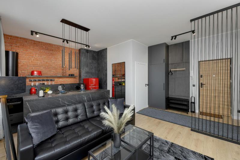 Exclusive Grey and Red Apartment in Warsaw Center by Noclegi Renters - image 4