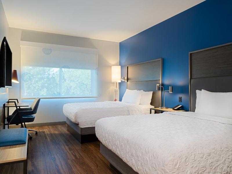 Queen Room with Two Queen Beds and Walk-In Shower image 1