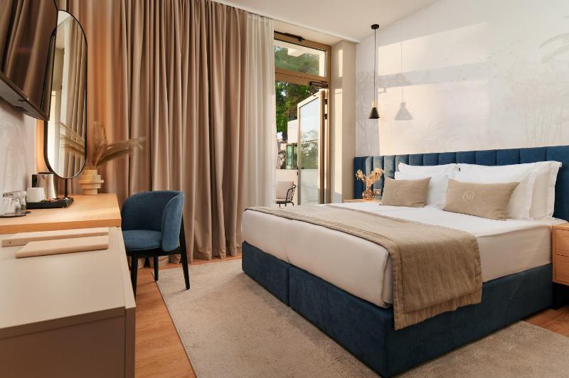 Premium Double or Twin Room with Sea and Pool view with a Balcony - Ground Floor image 1