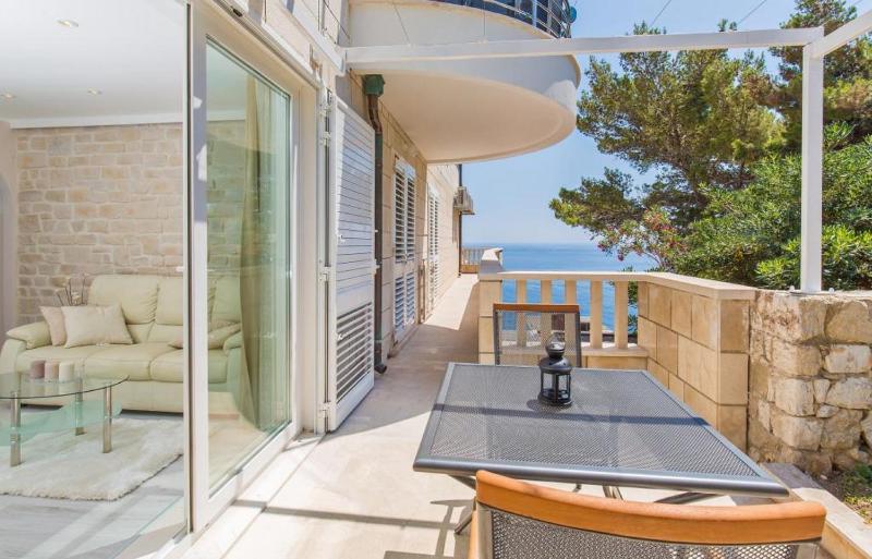 One Bedroom Apartment with Terrace and Side Sea View image 2