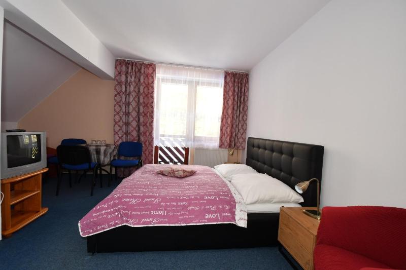 Quadruple Room with Balcony and Extra bed image 1