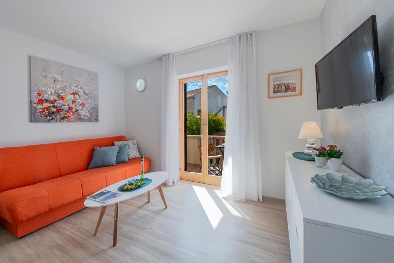 One-Bedroom Apartment with Balcony and Sea View image 1