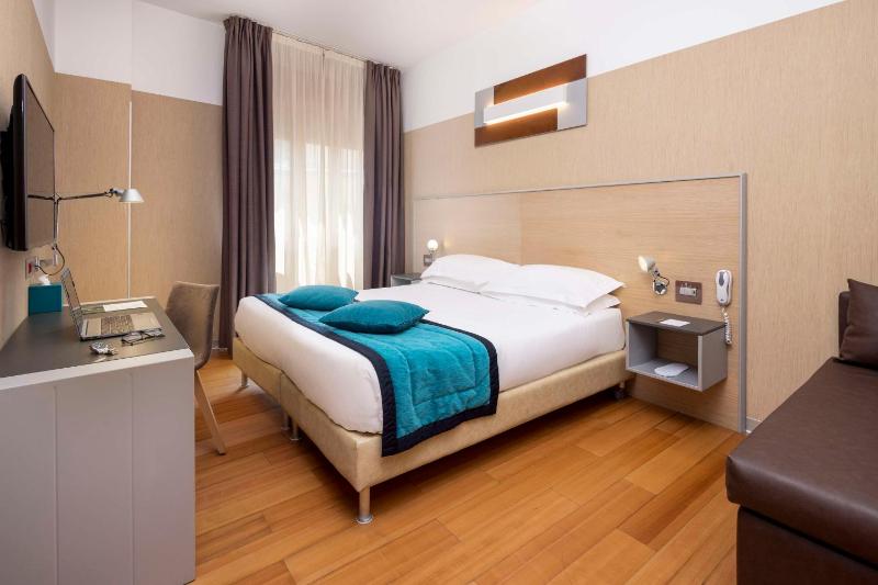 Deluxe King Room with Sofa Bed image 1