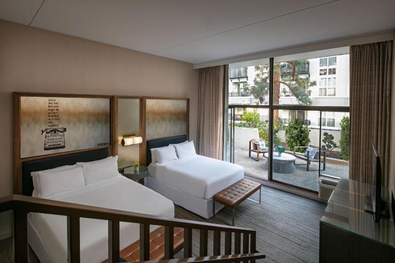 Bi-Level Queen Loft with Two Queen Beds and Patio image 3