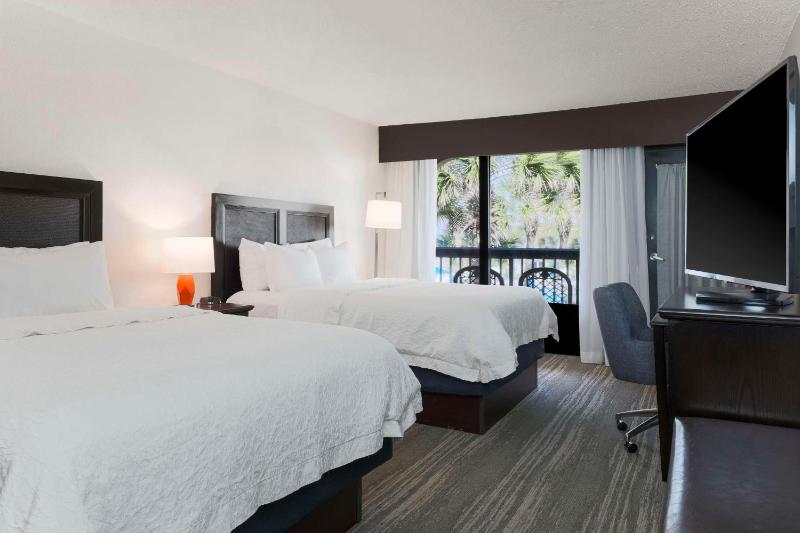 Queen Room with Two Queen Beds - Pool View/Private Patio image 3