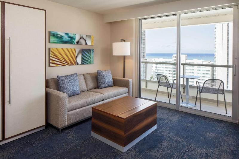 Suite with Two Double Beds and One Sofa Bed with Partial Ocean View image 4