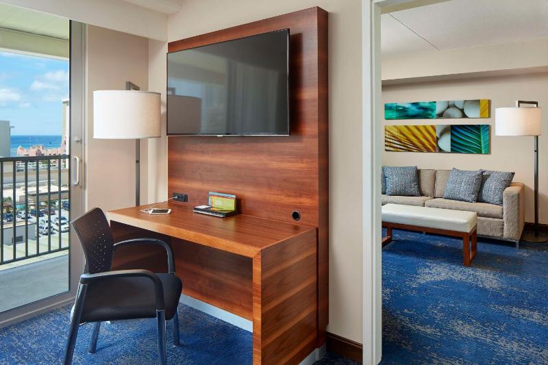 Suite with Two Double Beds and One Sofa Bed with Partial Ocean View image 3