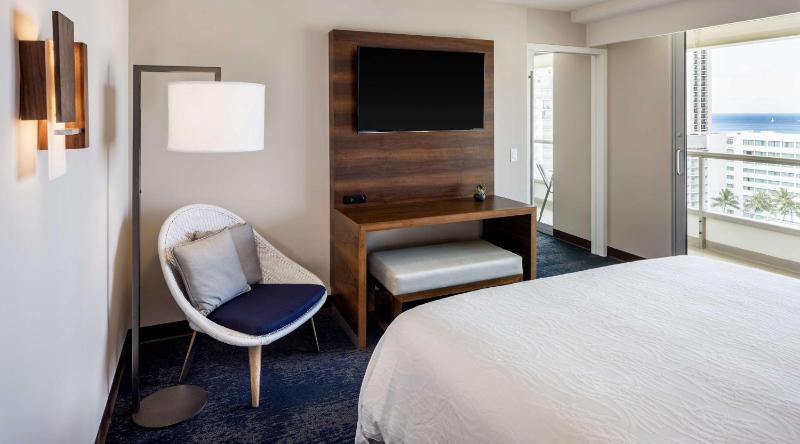 Suite with Two Double Beds and One Sofa Bed with Partial Ocean View image 2
