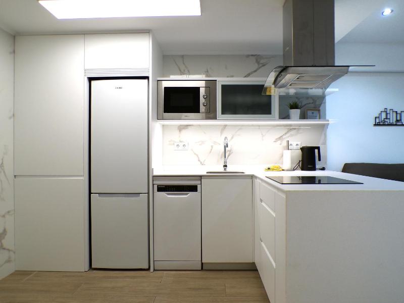 Moderno Apartamento con Piscina y Bicicletas Gratis - image 10