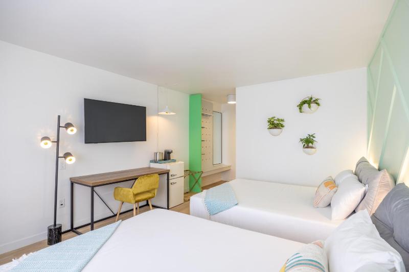Standard Queen Room with Two Queen Beds image 4