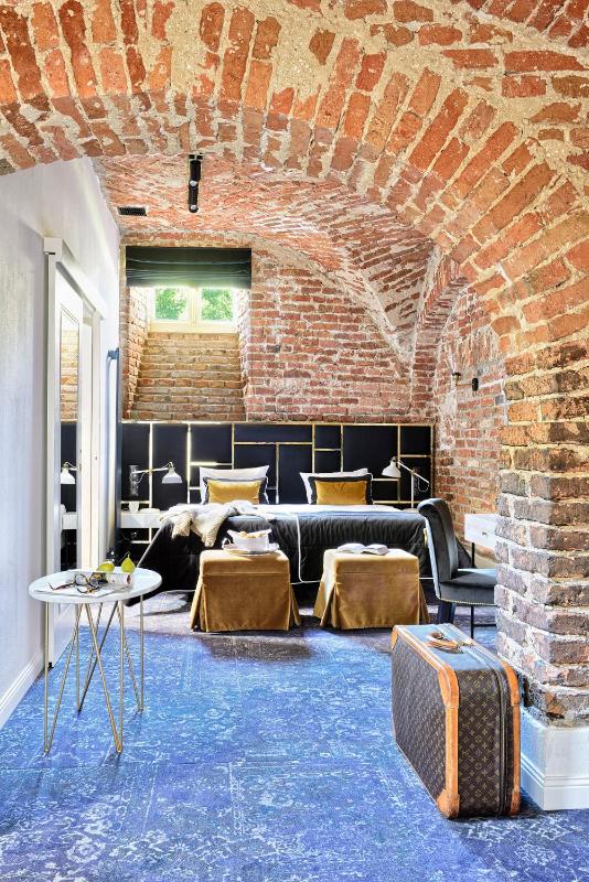 Apartment with historic brick image 1