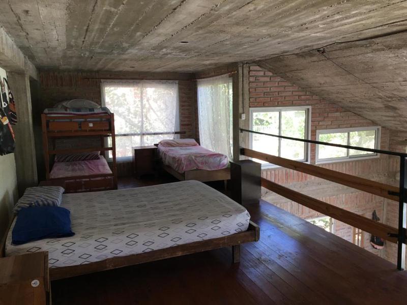 Casa Villa Carlos Paz con pileta frente al río - image 11