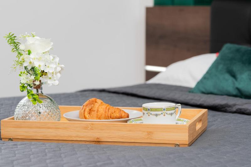 9th Floor Green and Grey Apartment in Gdańsk Brzeźno with Two Bedrooms and Parking by Noclegi Renters - image 15