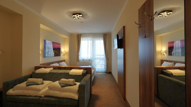 Quadruple Room with Balcony image 1