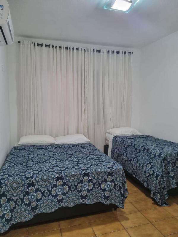 Apto Kampala a 50mt da praia de Pitangueiras - Localização privilegiada no coração do Guarujá 1 minuto da praia! - image 11