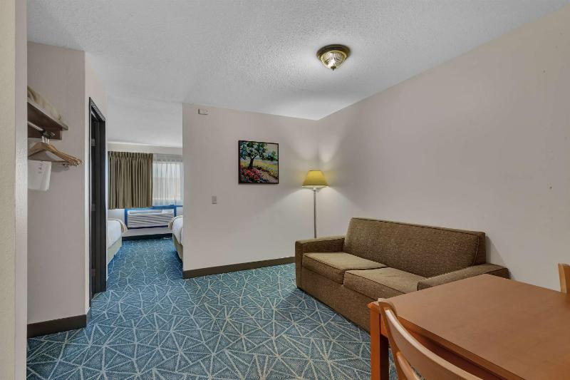 Queen Suite with Two Queen Beds and Sofa Bed image 1
