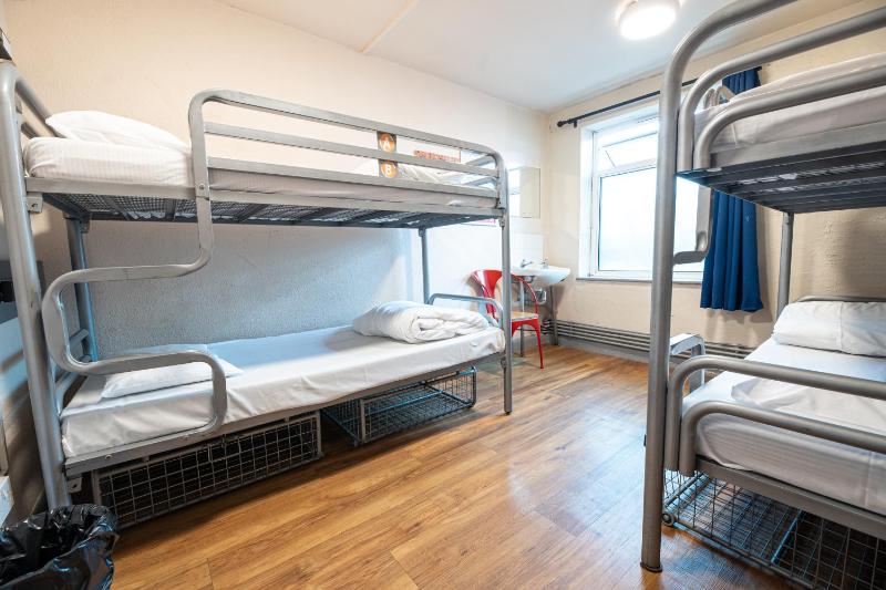 Bed in 4-Bed Mixed Dormitory Room with External Shared Bathroom image 1