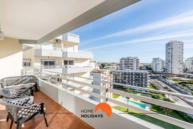 #210 Balcony with Tennis Court and AC Images