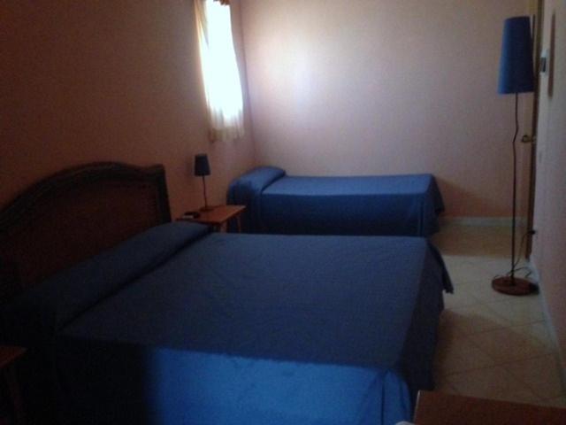Quadruple Room with Private Bathroom image 1