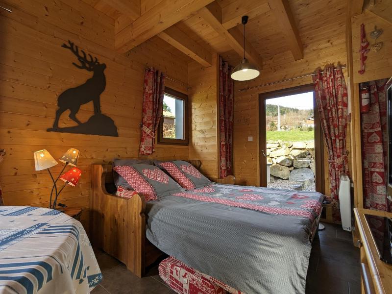 Chalet neuf à Gérardmer avec terrasse et parking privé - FR-1-589-465 - image 12
