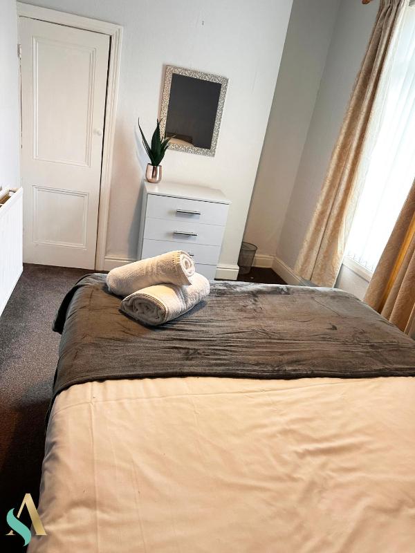 Three-Bedroom Apartment image 2
