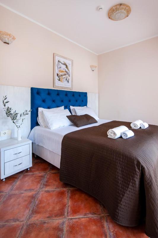 One-Bedroom Apartment with Balcony and City View image 1