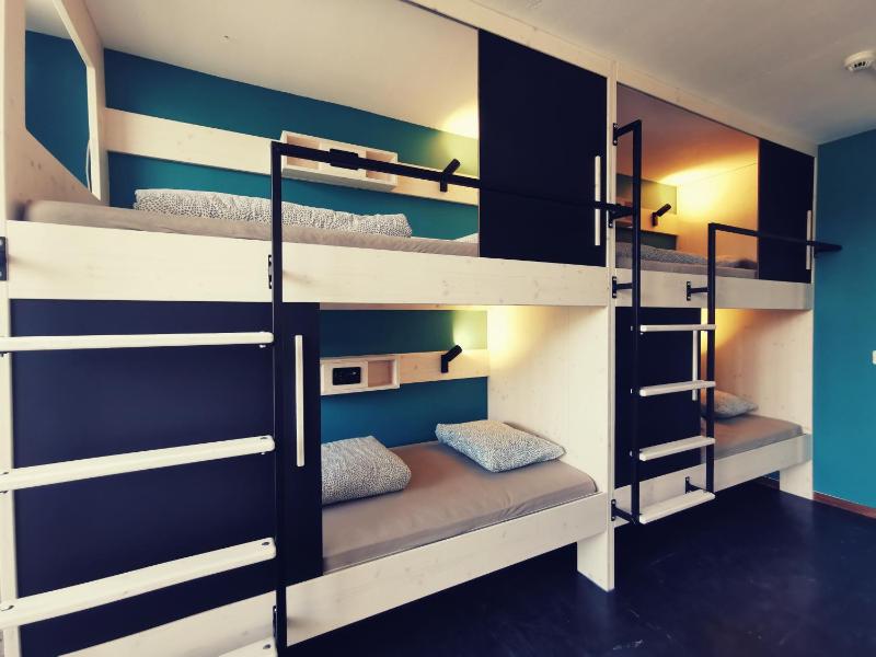 Single Bed in 4-Bed Female Dormitory Room with Shared Bathroom image 1